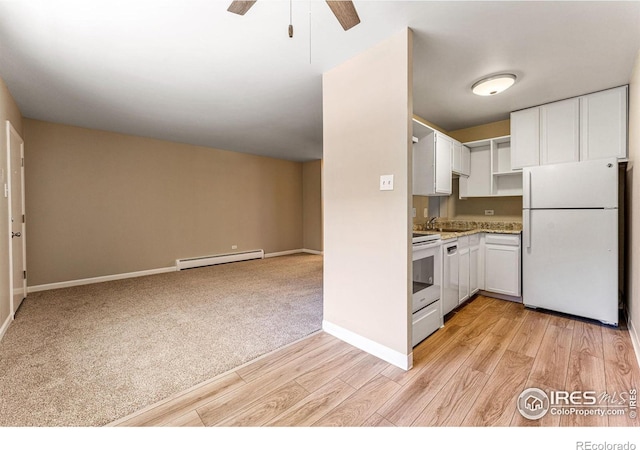 830 20th St Unit 203, Boulder, CO 80302 - kitchen featuring white appliances, a baseboard heating unit, light wood-type flooring, white cabinetry, and a ceiling fan