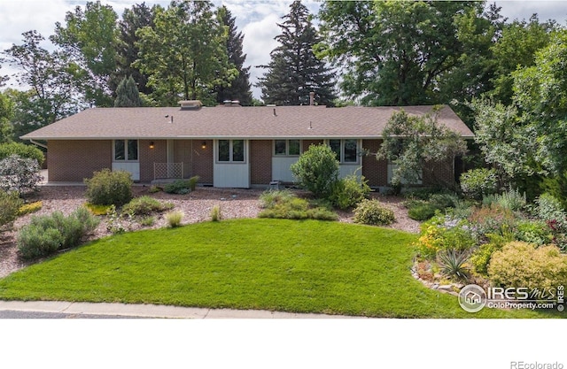 7290 Mount Sherman Rd, Longmont, CO 80503 - ranch-style home with a front yard