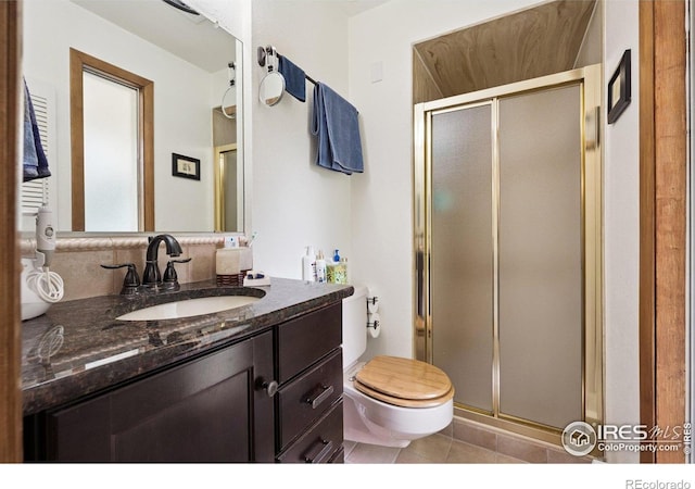 7290 Mount Sherman Rd, Longmont, CO 80503 - full bathroom featuring a shower stall, vanity, and tile patterned flooring