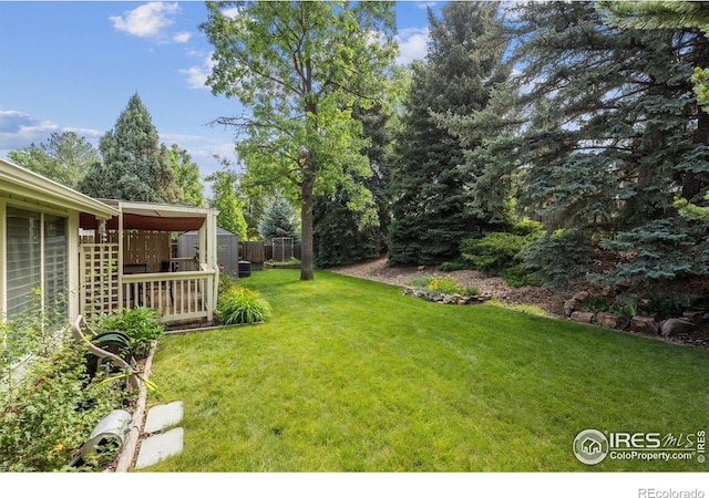 7290 Mount Sherman Rd, Longmont, CO 80503 - view of yard with a storage unit