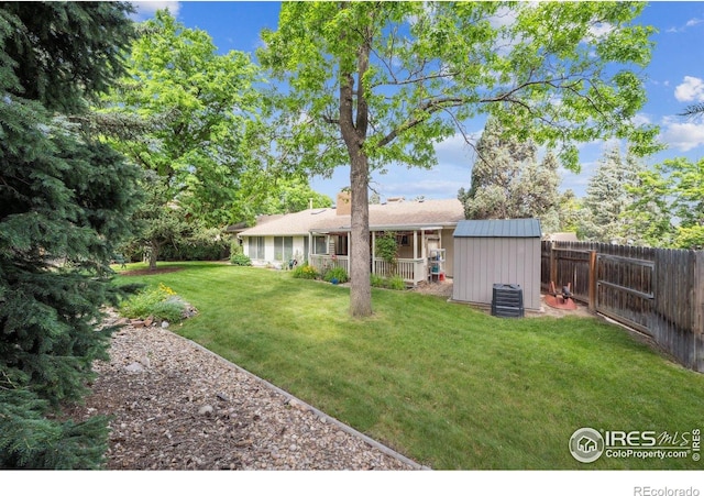 7290 Mount Sherman Rd, Longmont, CO 80503 - fenced backyard featuring a storage shed
