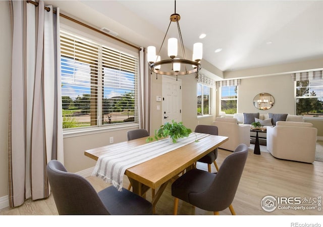 2599 Trio Falls Dr, Loveland, CO 80538 - dining area with a chandelier, light wood-type flooring, and recessed lighting
