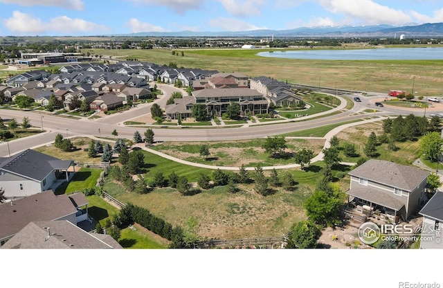 2599 Trio Falls Dr, Loveland, CO 80538 - aerial perspective of suburban area with a nearby body of water