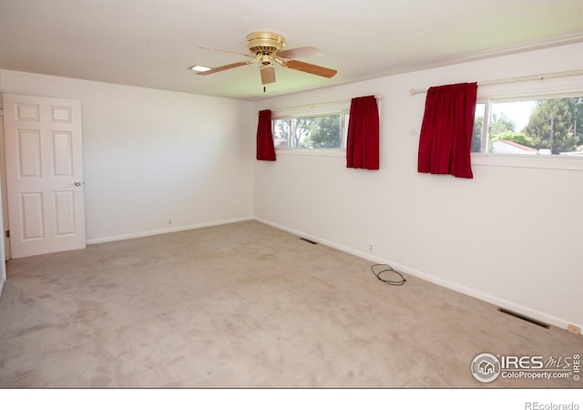 947 Holden Ln, Sterling, CO 80751 - empty room featuring a ceiling fan and carpet floors