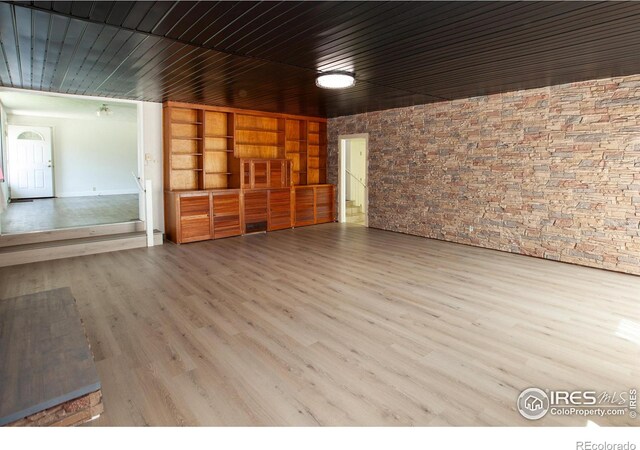 947 Holden Ln, Sterling, CO 80751 - spare room featuring wood finished floors and wooden ceiling
