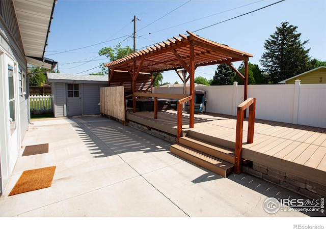 947 Holden Ln, Sterling, CO 80751 - view of patio / terrace featuring a pergola, a deck, and a storage shed