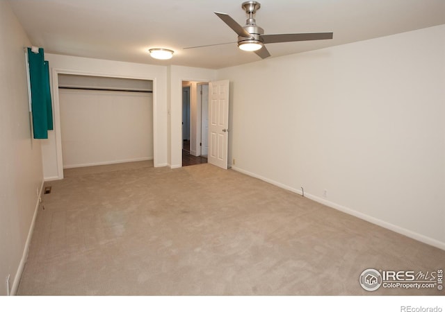 947 Holden Ln, Sterling, CO 80751 - unfurnished bedroom featuring carpet, a closet, and a ceiling fan