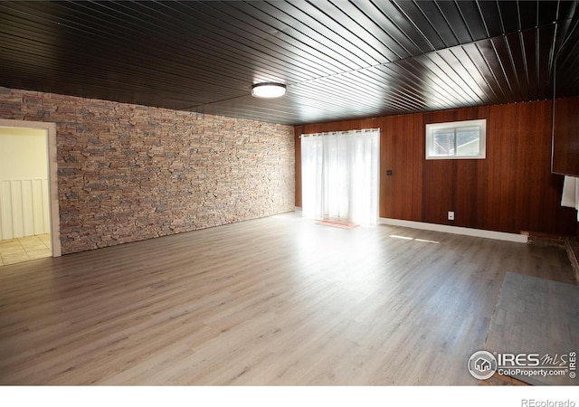 947 Holden Ln, Sterling, CO 80751 - empty room with wooden ceiling and wood finished floors