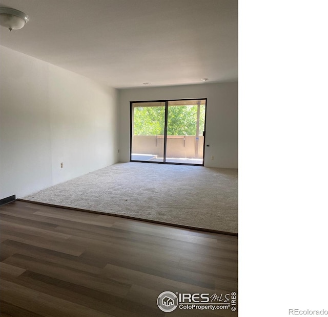 2227 Canyon Blvd Unit 359B, Boulder, CO 80302 - unfurnished room with carpet flooring and wood finished floors