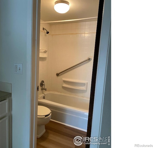 2227 Canyon Blvd Unit 359B, Boulder, CO 80302 - full bath featuring washtub / shower combination, wood finished floors, and vanity