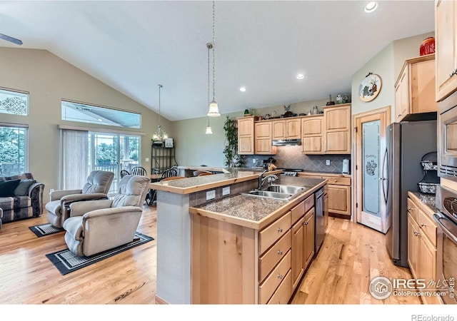 9629 Bountiful St, Firestone, CO 80504 - kitchen with light brown cabinets, light wood finished floors, open floor plan, plenty of natural light, and recessed lighting