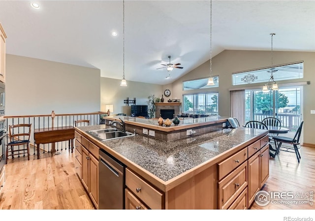 9629 Bountiful St, Firestone, CO 80504 - kitchen featuring dishwasher, tile countertops, ceiling fan, light wood-type flooring, and high vaulted ceiling