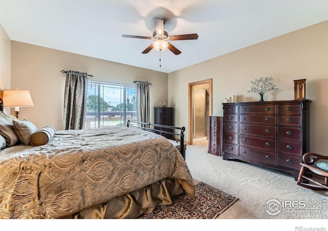9629 Bountiful St, Firestone, CO 80504 - bedroom featuring light colored carpet, access to outside, ceiling fan, and ensuite bath