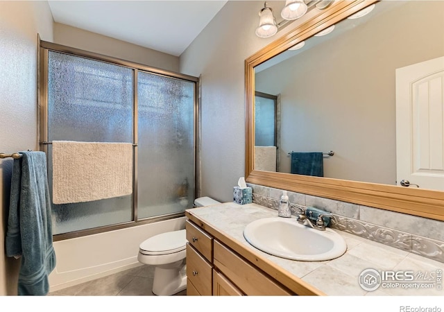 9629 Bountiful St, Firestone, CO 80504 - full bath with vanity, tile patterned floors, and enclosed tub / shower combo