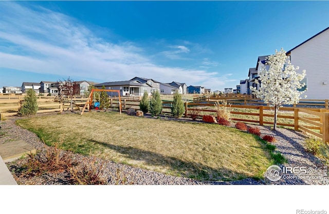 6013 Goodnight Ave, Timnath, CO 80547 - view of yard featuring a residential view