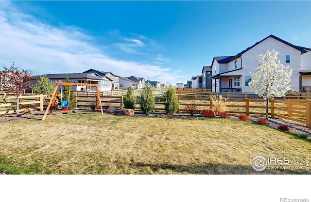 6013 Goodnight Ave, Timnath, CO 80547 - view of yard with a playground and a residential view