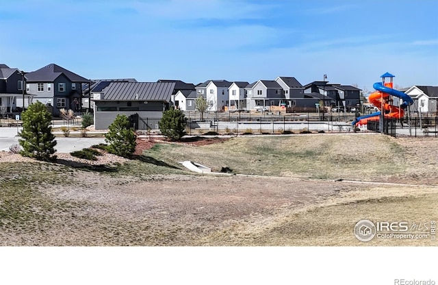 6013 Goodnight Ave, Timnath, CO 80547 - view of yard with a residential view and a playground