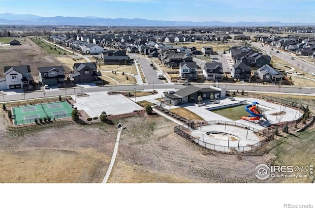 6013 Goodnight Ave, Timnath, CO 80547 - aerial perspective of suburban area with a mountain backdrop