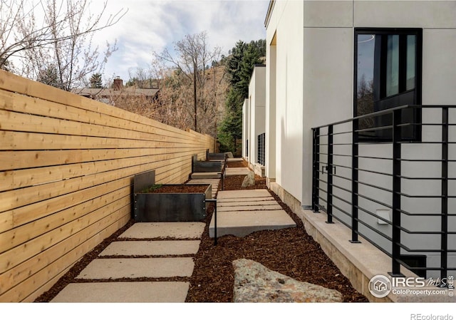 358 Arapahoe Ave Unit B, Boulder, CO 80302 - view of property exterior featuring stucco siding