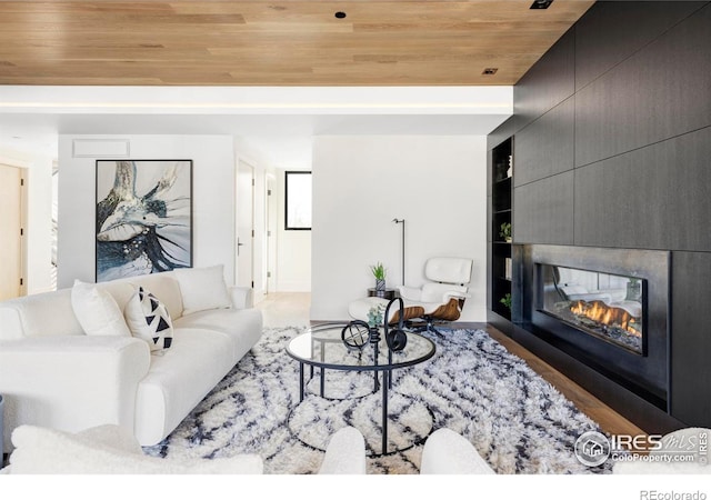 358 Arapahoe Ave Unit B, Boulder, CO 80302 - living room featuring wood ceiling and a fireplace