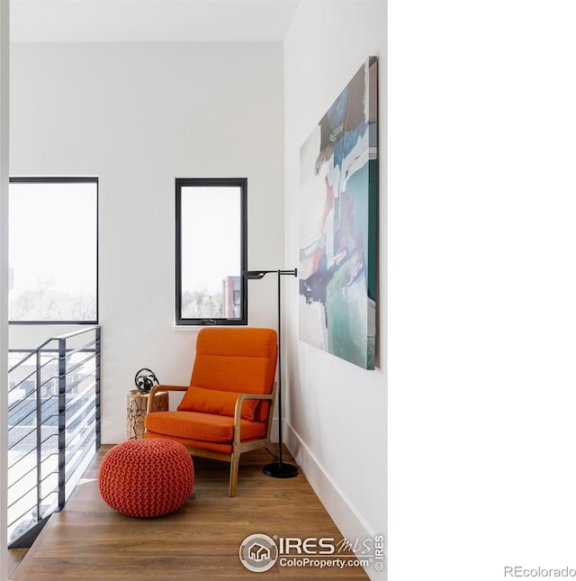 358 Arapahoe Ave Unit B, Boulder, CO 80302 - sitting room with plenty of natural light and wood finished floors