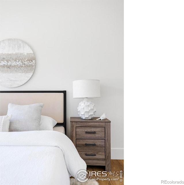 358 Arapahoe Ave Unit B, Boulder, CO 80302 - bedroom with wood finished floors and baseboards