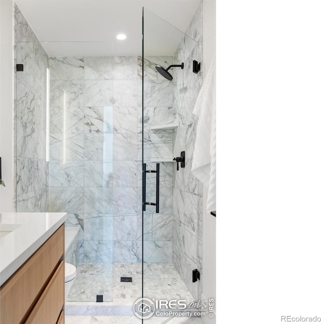 358 Arapahoe Ave Unit B, Boulder, CO 80302 - full bath with a marble finish shower, vanity, and recessed lighting