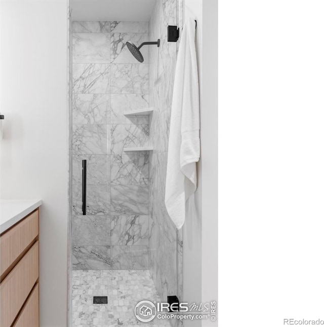 358 Arapahoe Ave Unit B, Boulder, CO 80302 - bathroom with a marble finish shower and vanity