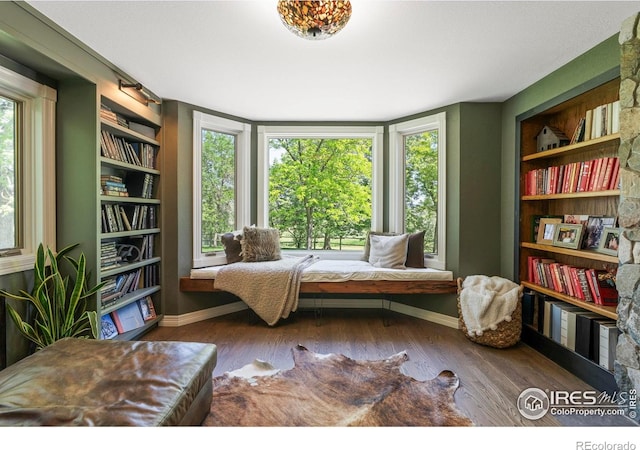 5575 Saint Vrain Rd, Longmont, CO 80503 - sitting room featuring wood finished floors and built in features