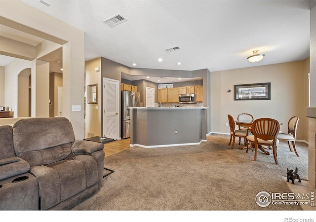 64 Whitehaven Cir, Highlands Ranch, CO 80129 - living room with light carpet and recessed lighting