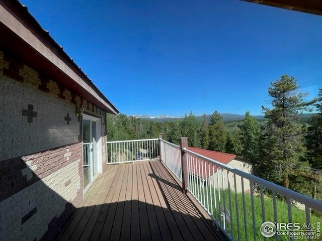 8 Valley View Dr, Nederland, CO 80466 - deck with a wooded view