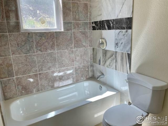 8 Valley View Dr, Nederland, CO 80466 - bathroom featuring a textured wall and bathing tub / shower combination