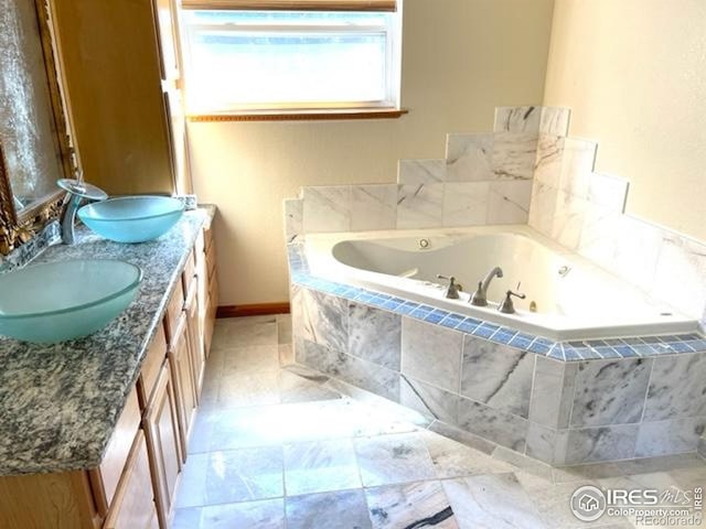 8 Valley View Dr, Nederland, CO 80466 - bathroom with a whirlpool tub and double vanity
