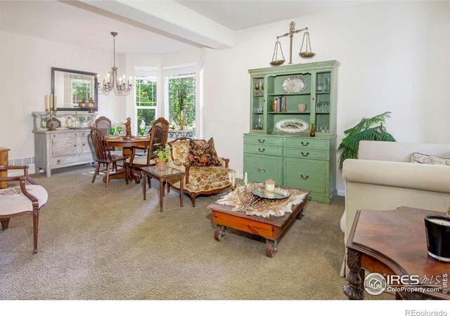 121 Osprey Ln, Lyons, CO 80540 - carpeted living room with a chandelier