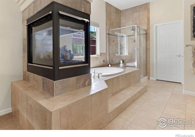 121 Osprey Ln, Lyons, CO 80540 - full bathroom with a stall shower, a bath, and tile patterned floors
