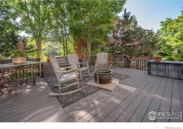 121 Osprey Ln, Lyons, CO 80540 - deck with a fire pit and outdoor dining area