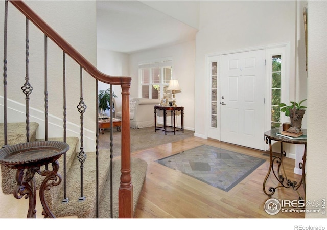 121 Osprey Ln, Lyons, CO 80540 - foyer featuring wood finished floors and stairway