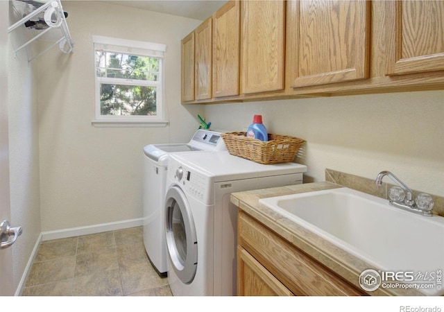 121 Osprey Ln, Lyons, CO 80540 - washroom with cabinet space and washing machine and clothes dryer