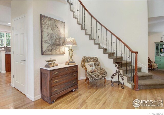121 Osprey Ln, Lyons, CO 80540 - stairway with wood finished floors and baseboards