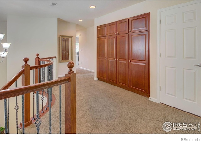 121 Osprey Ln, Lyons, CO 80540 - corridor featuring an upstairs landing, light carpet, and recessed lighting