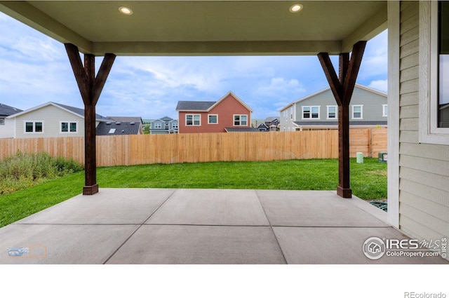 2397 Bristol St, Superior, CO 80027 - fenced backyard featuring a patio area and a residential view