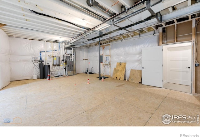 2397 Bristol St, Superior, CO 80027 - unfinished below grade area with a water softener and heating unit