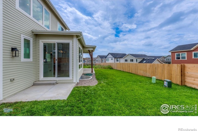 2397 Bristol St, Superior, CO 80027 - fenced backyard with a patio and a residential view