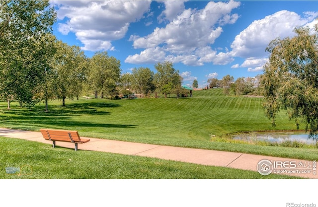2397 Bristol St, Superior, CO 80027 - surrounding community with a yard and a water view