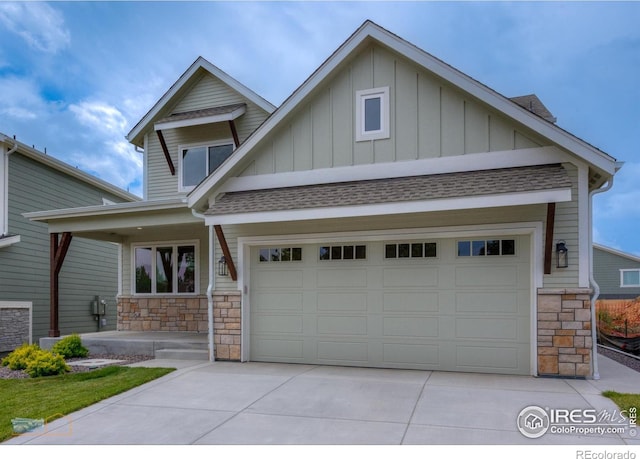 2397 Bristol St, Superior, CO 80027 - craftsman inspired home featuring stone siding, board and batten siding, concrete driveway, and a porch