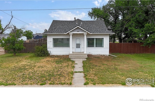595 E Kiser Ave, Keenesburg, CO 80643 - bungalow-style house with roof with shingles