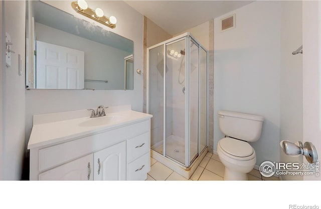 595 E Kiser Ave, Keenesburg, CO 80643 - full bathroom with vanity, a shower stall, and tile patterned floors