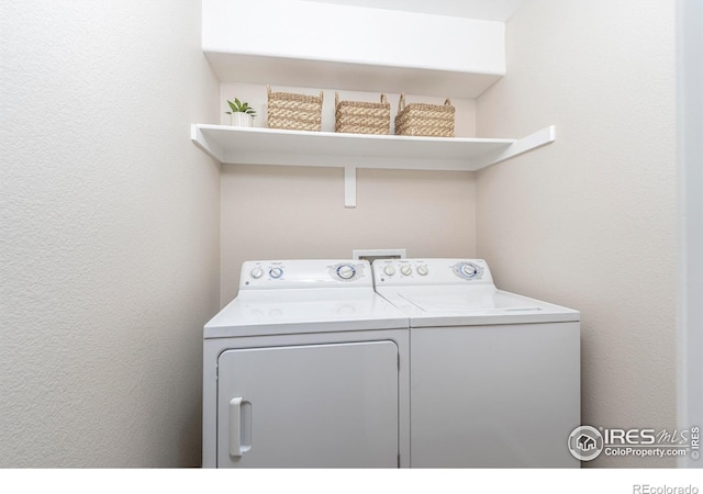 829 Kane Dr Unit 23, Longmont, CO 80501 - laundry area with washer and clothes dryer