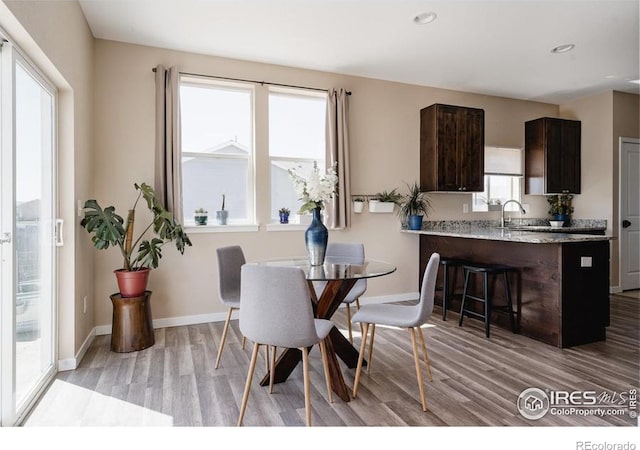184 S 2nd Ave, Deer Trail, CO 80105 - dining space with light wood finished floors and recessed lighting
