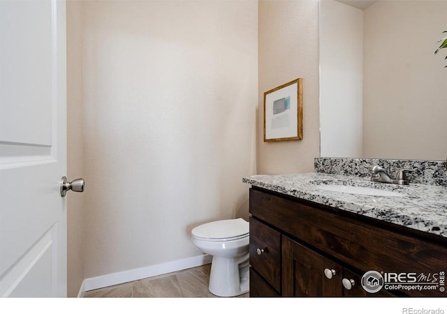 184 S 2nd Ave, Deer Trail, CO 80105 - bathroom featuring vanity and toilet